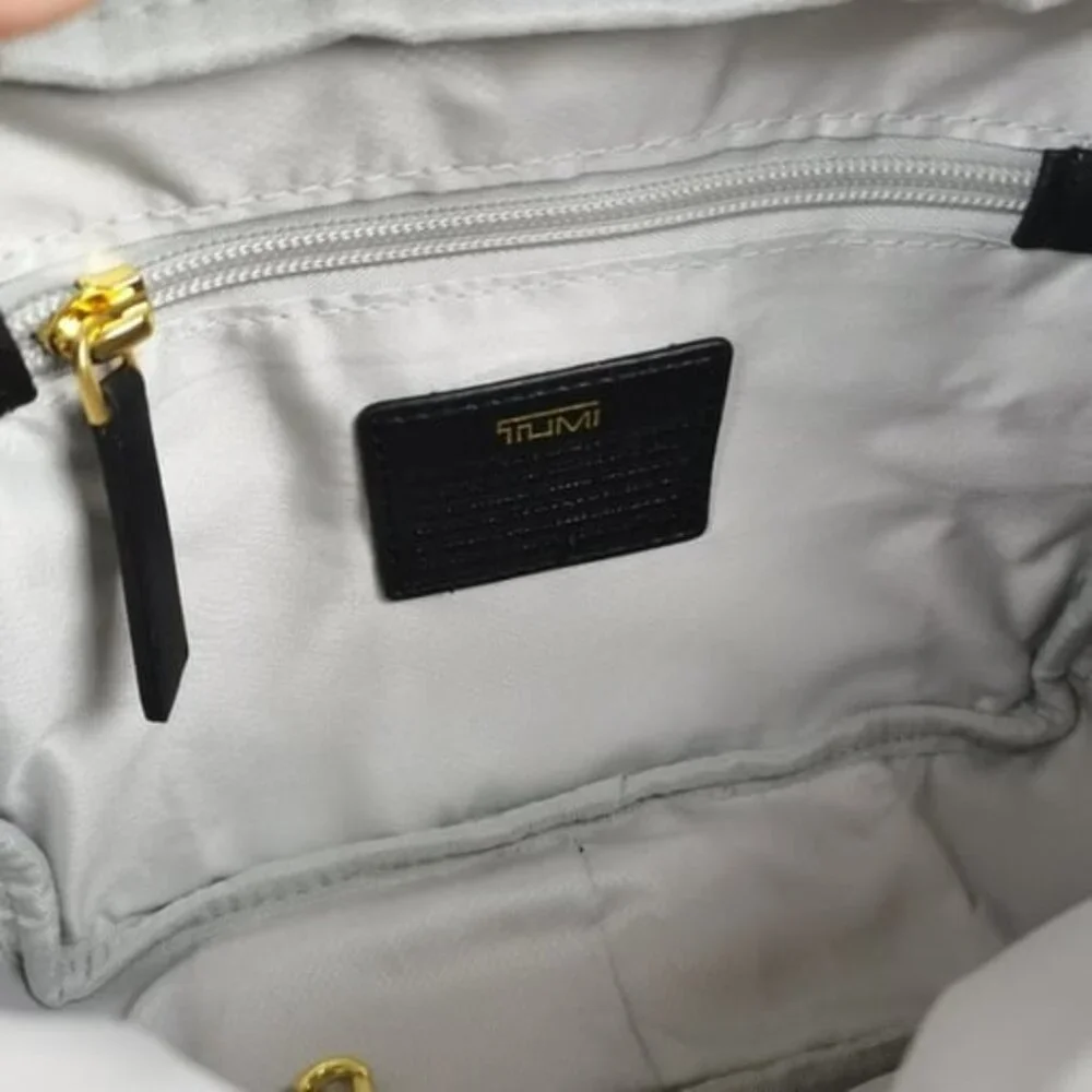 Tumi Voyageur Troy Zip Pocket Crossbody Bag in Black/Gold